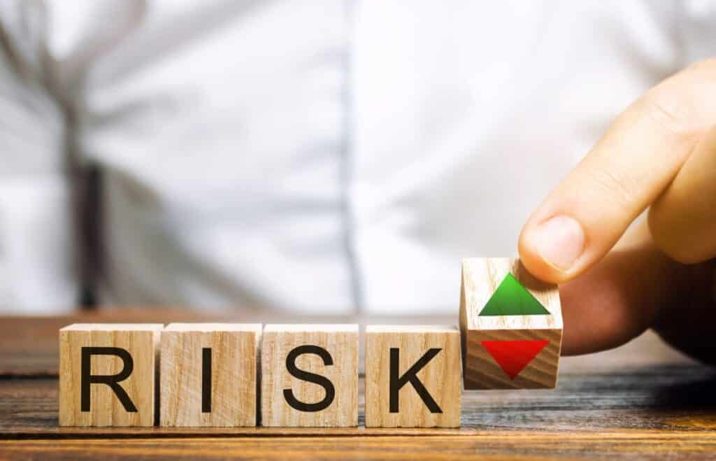 Risk spelled out with wooden blocks COMDEX Score explained article